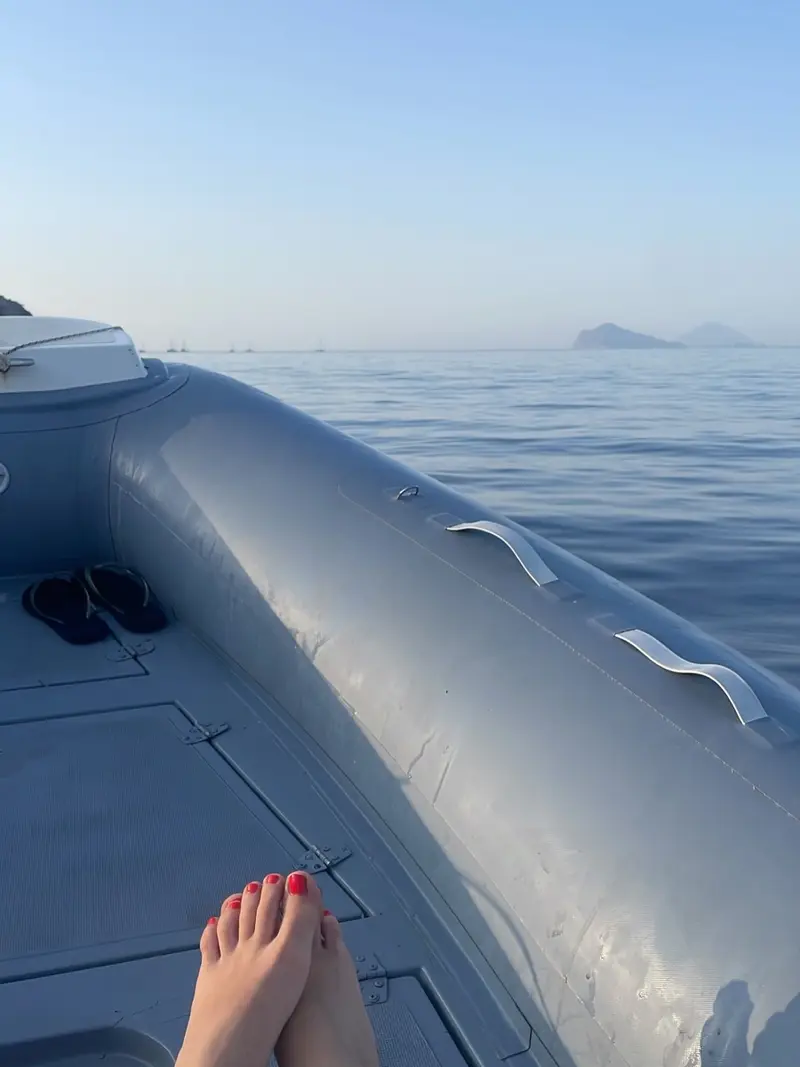 Dinghy cruising on calm sea
